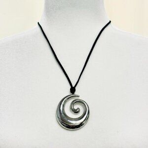 Silver tone spiral pendant necklace with black cord